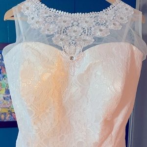 Brand new never worn or altered white lace wedding dress